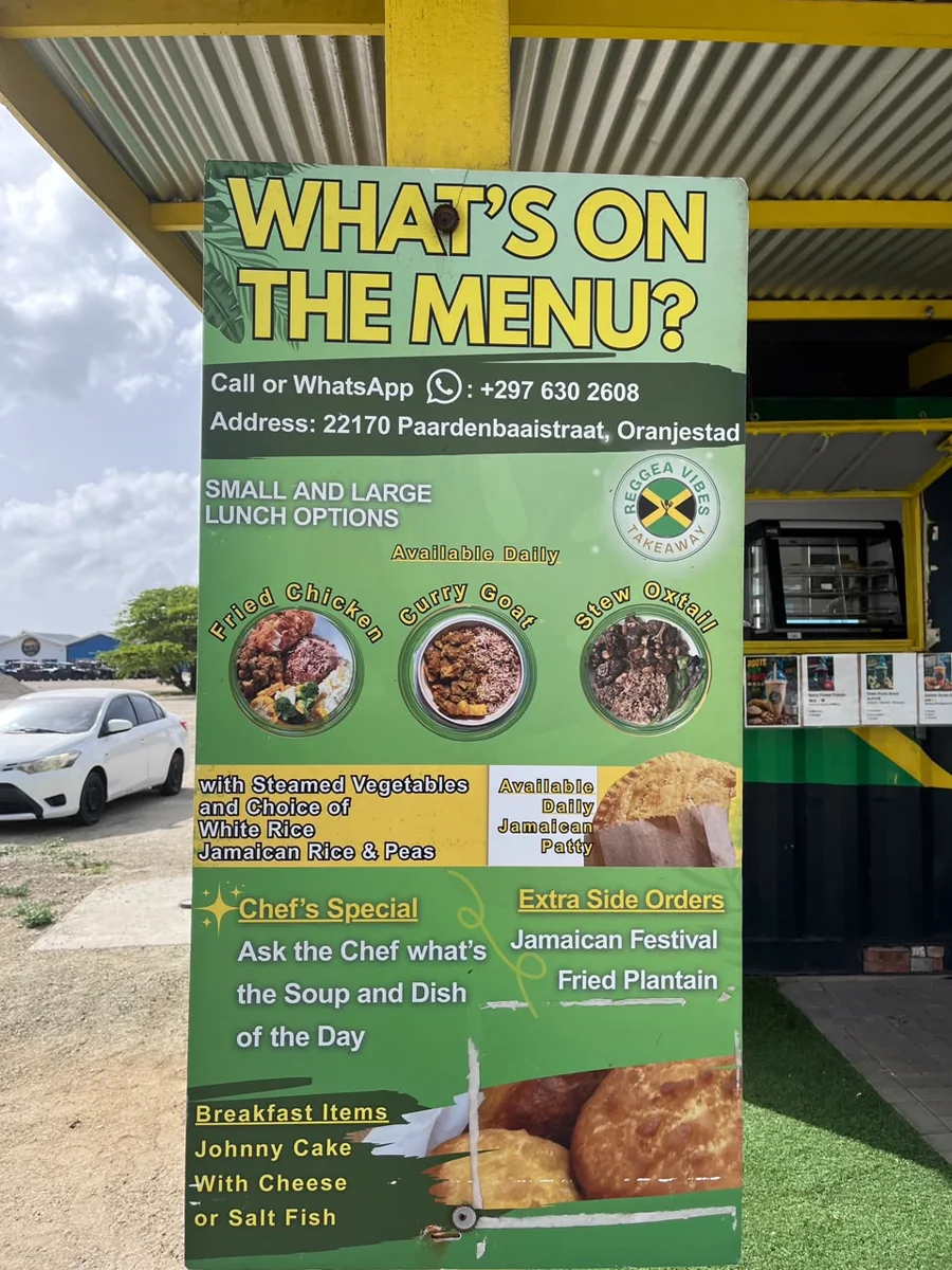 The What’s On The Menu board at the Reggae Vibes stand on Paardenbaaistraat